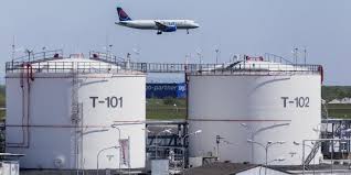 storage tank with plane overhead