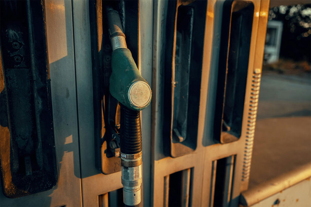 Close-up of gas pump nozzle at sunset