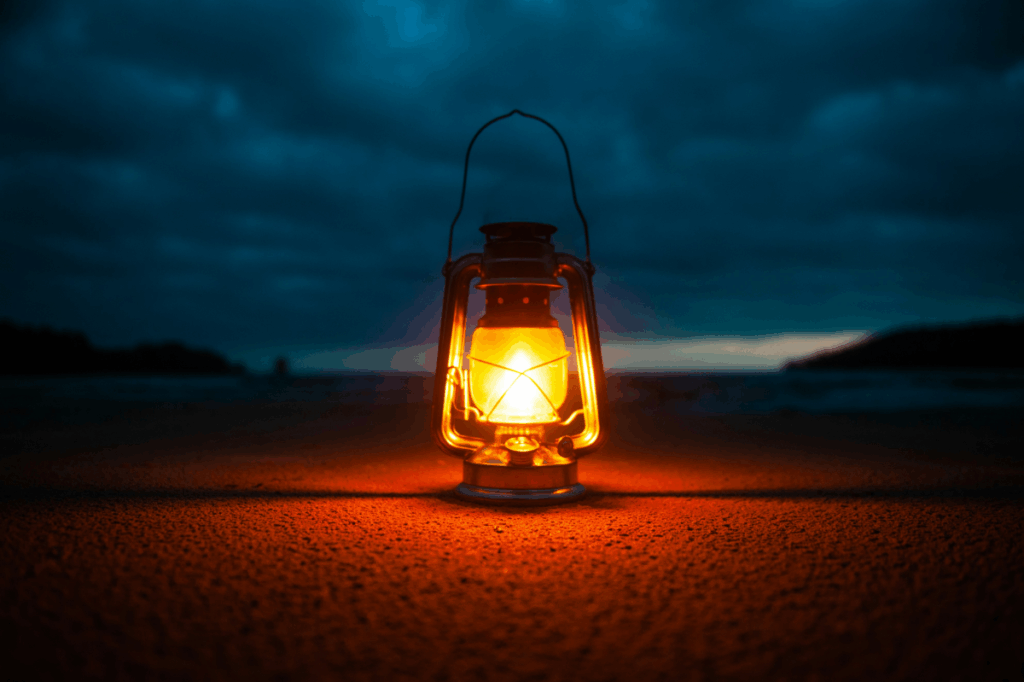 Lit kerosene lamp standing erect