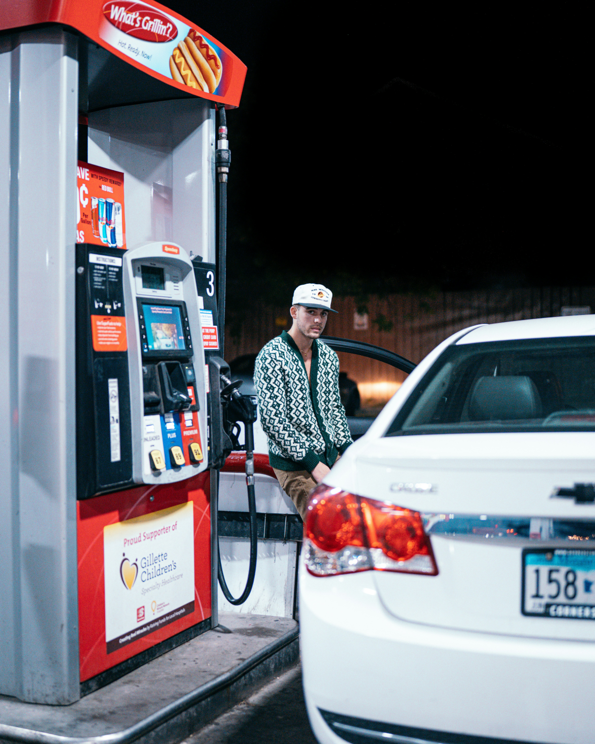 Man pumping fuel in a car