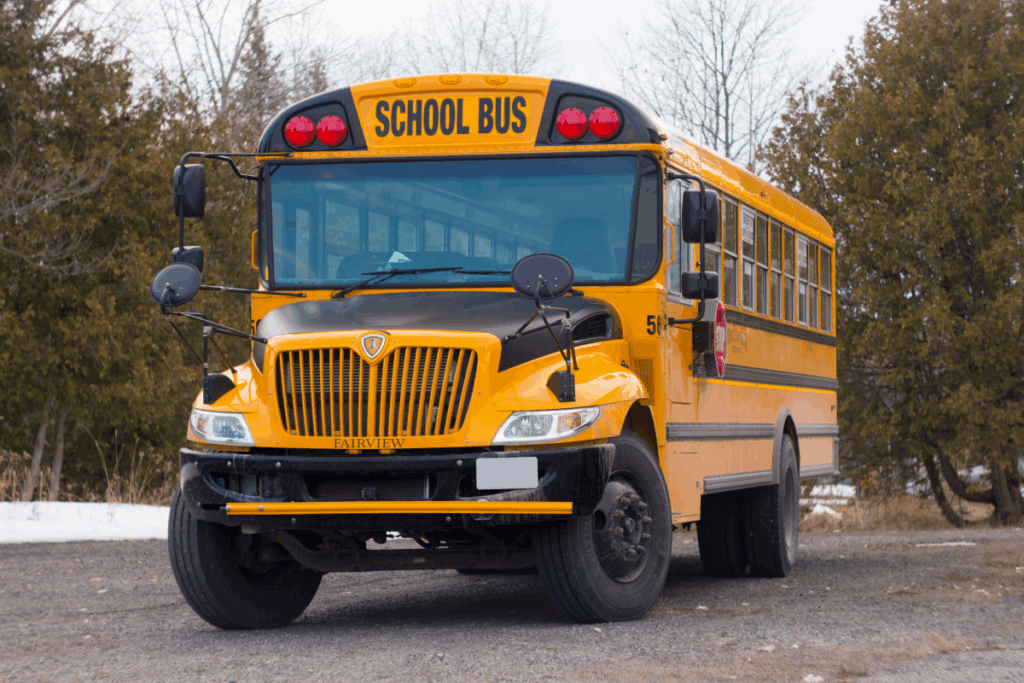 hello school bus in a parking lot