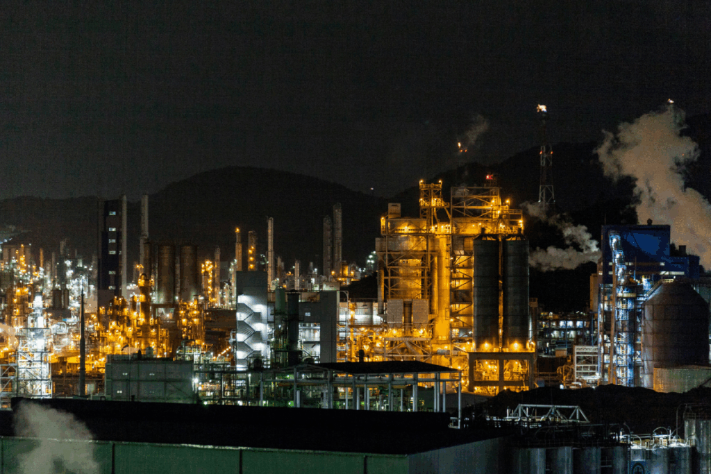 Petrol refinery brightly lit at night